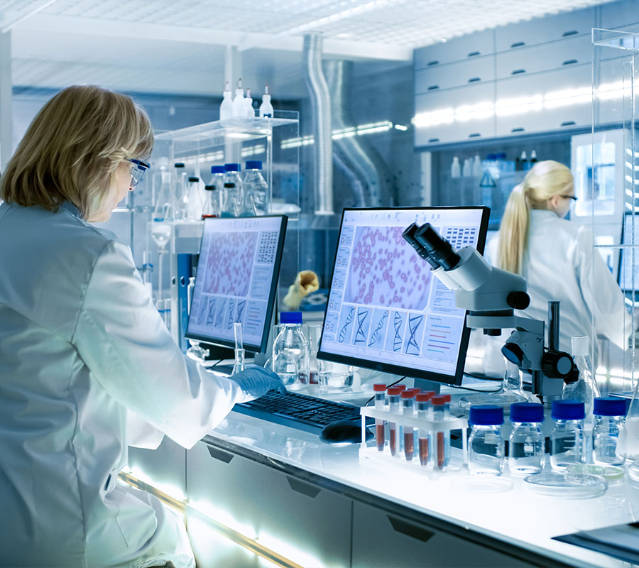 Woman working at a computer in a laboratory