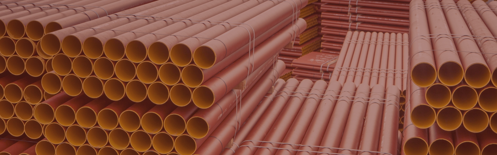 Stacked cast iron pipes